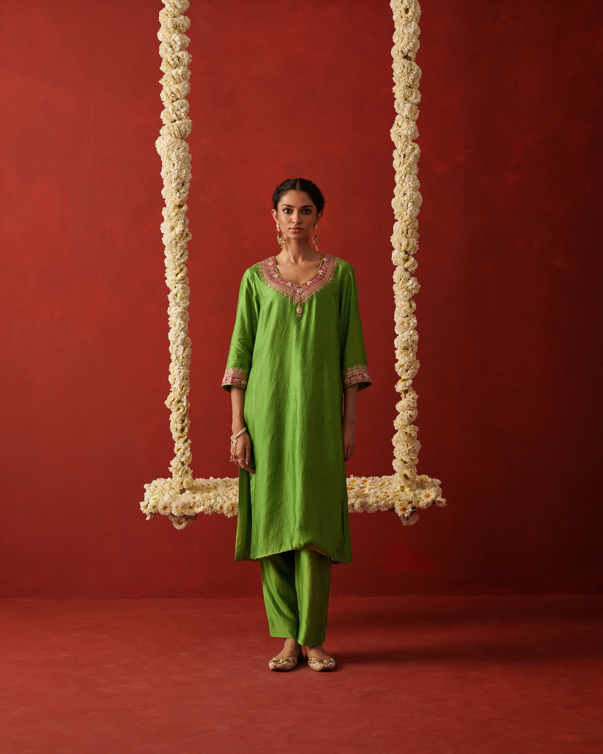 JHOOMAR & SHAFAQ pink silk kurta set with floral motifs by Rashika Mittal - front view