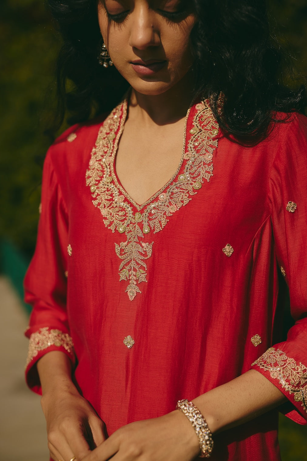 FARIHA & NAZEERA red chanderi kurta set with floral motifs by Rashika Mittal - close-up detail