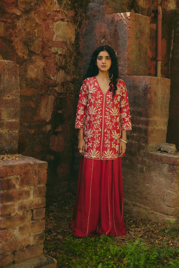 LAALSA & RAVAYA red silk sharara set with floral motifs by Rashika Mittal - front view