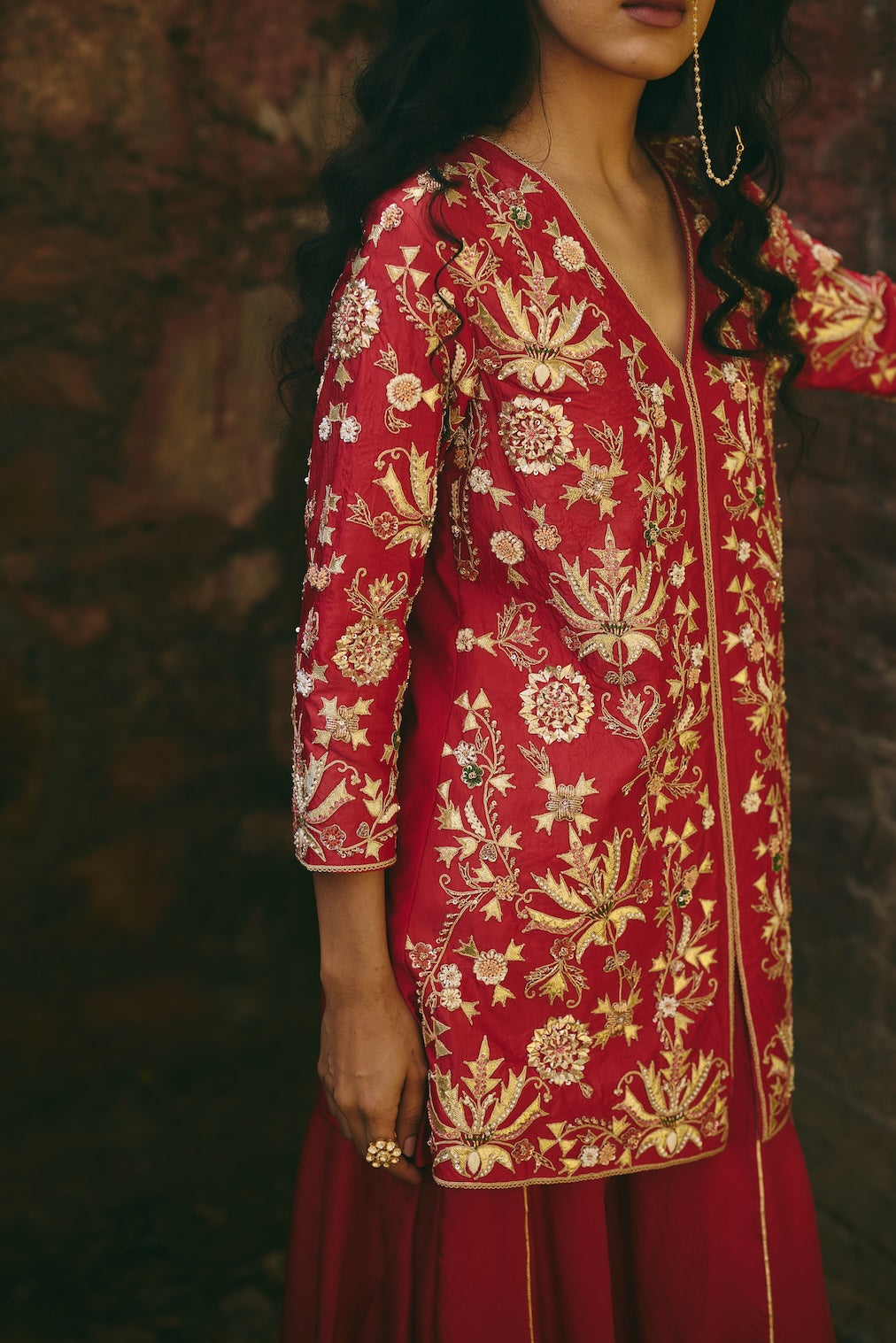 LAALSA & RAVAYA red silk sharara set with floral motifs by Rashika Mittal - close-up detail