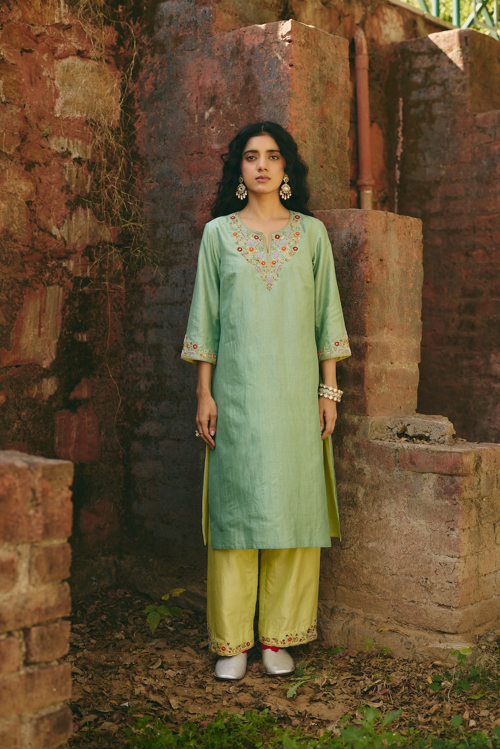 SAHIRA & FIZZA pistachio silk kurta set with floral motifs by Rashika Mittal - front view