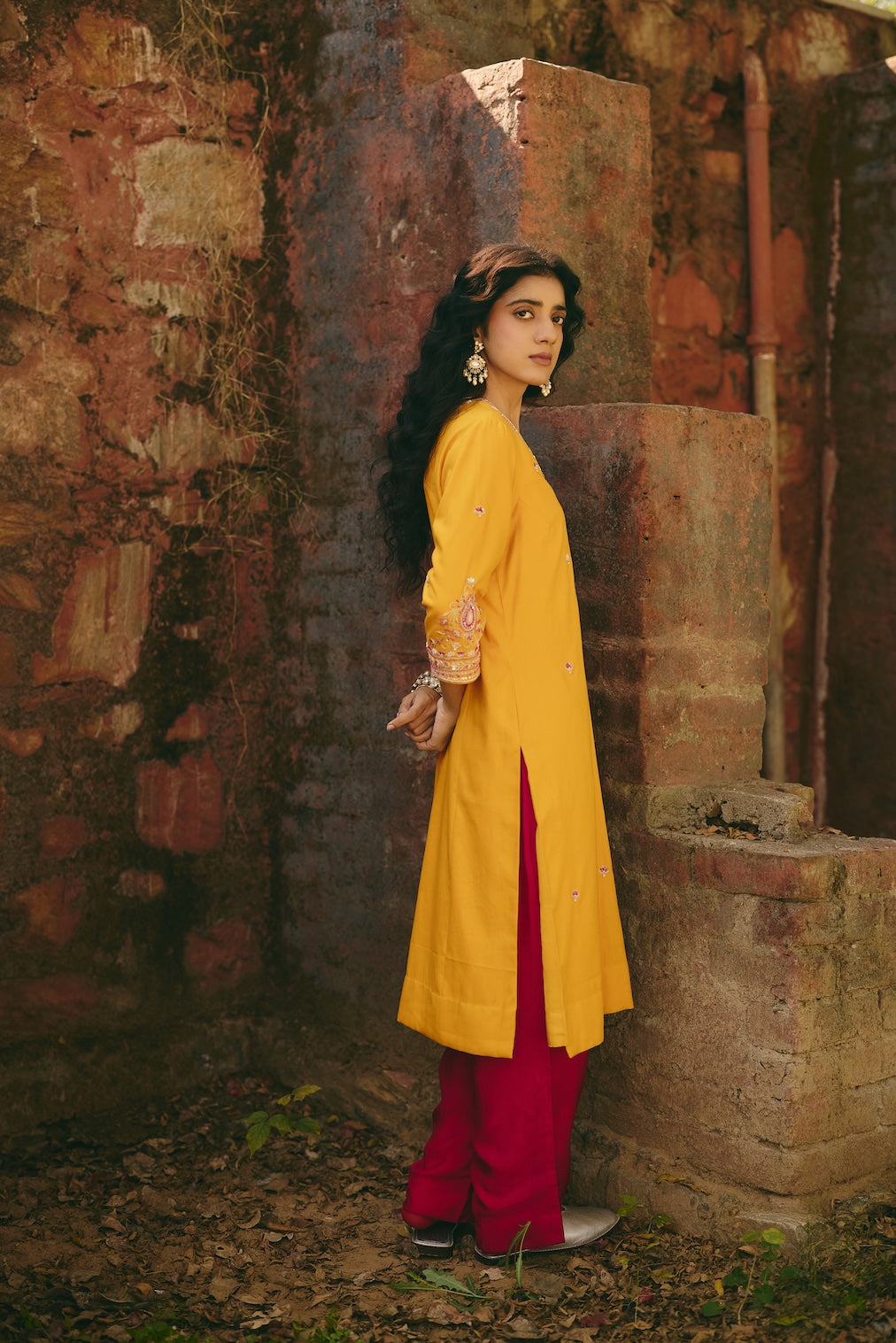 SANA & RIA mustard satin kurta set with floral motifs by Rashika Mittal - back view
