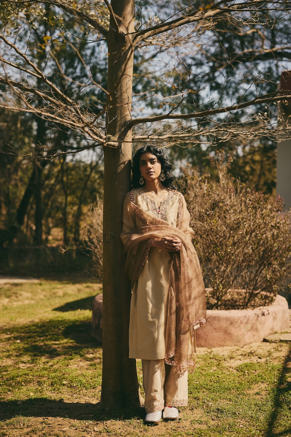 OSHANI & VRITIKA champagne chanderi kurta set with botanical motifs by Rashika Mittal - styled look