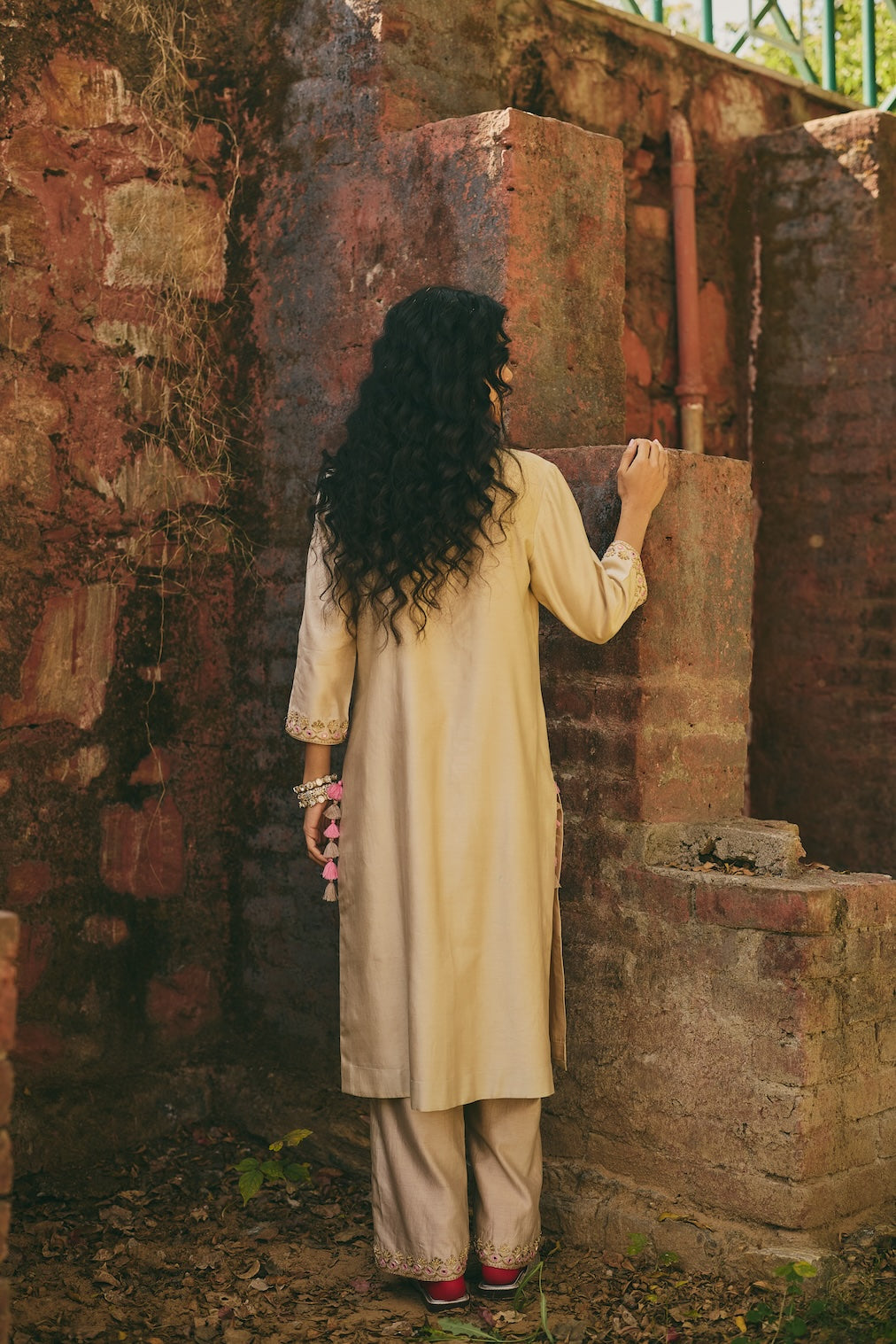 OSHANI & VRITIKA champagne chanderi kurta set with botanical motifs by Rashika Mittal - close-up detail