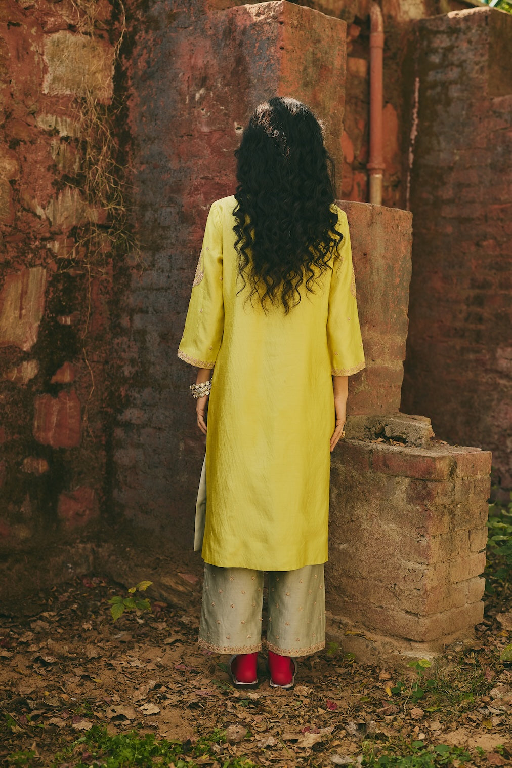 SUFRA & NAYAB sage silk kurta set with paisley motifs by Rashika Mittal - close-up detail