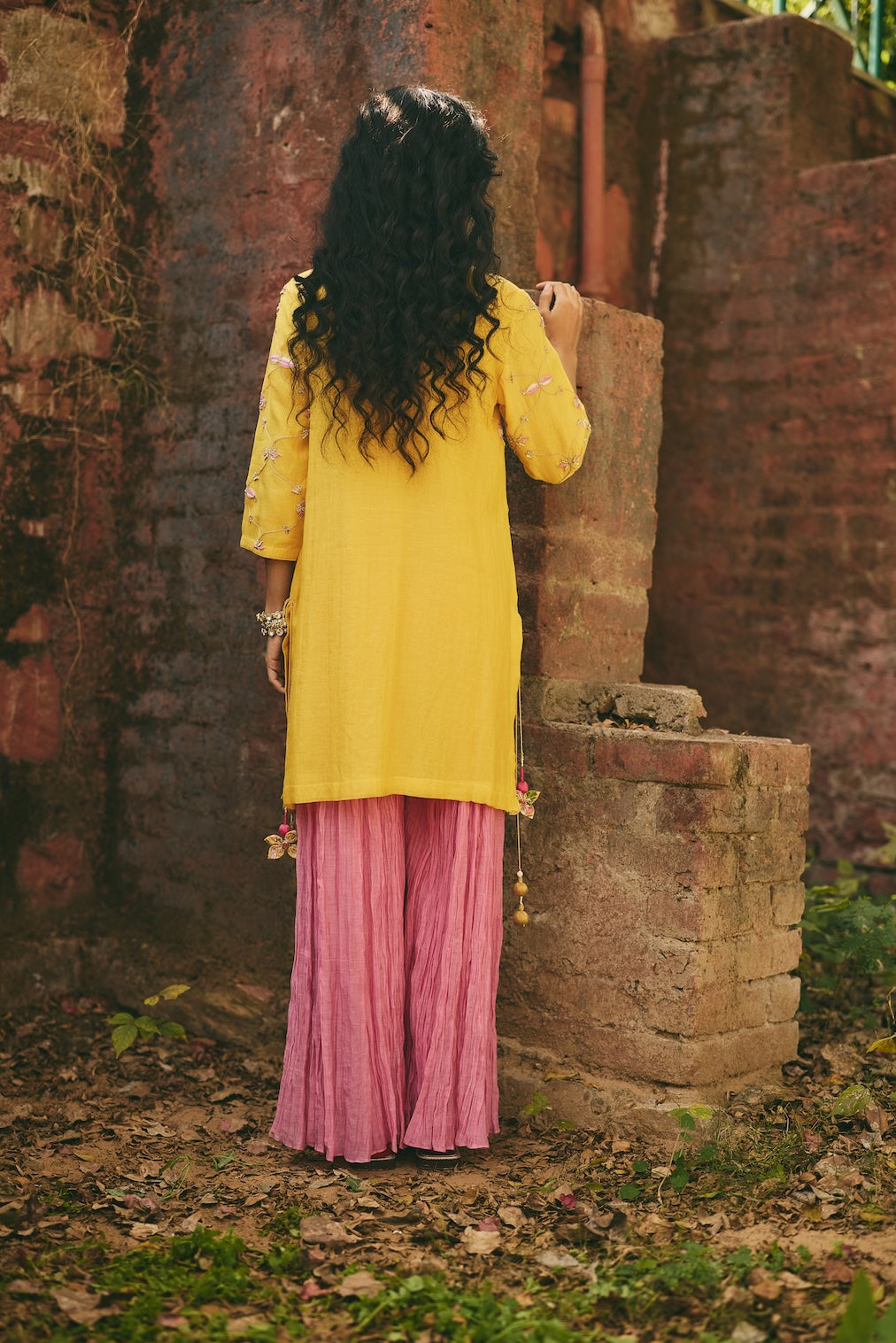 ROSHNI & NAZREEN mustard chanderi sharara set with trellis motifs by Rashika Mittal - styled look