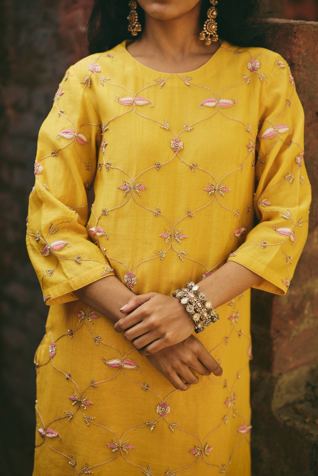 ROSHNI & NAZREEN mustard chanderi sharara set with trellis motifs by Rashika Mittal - fabric detail