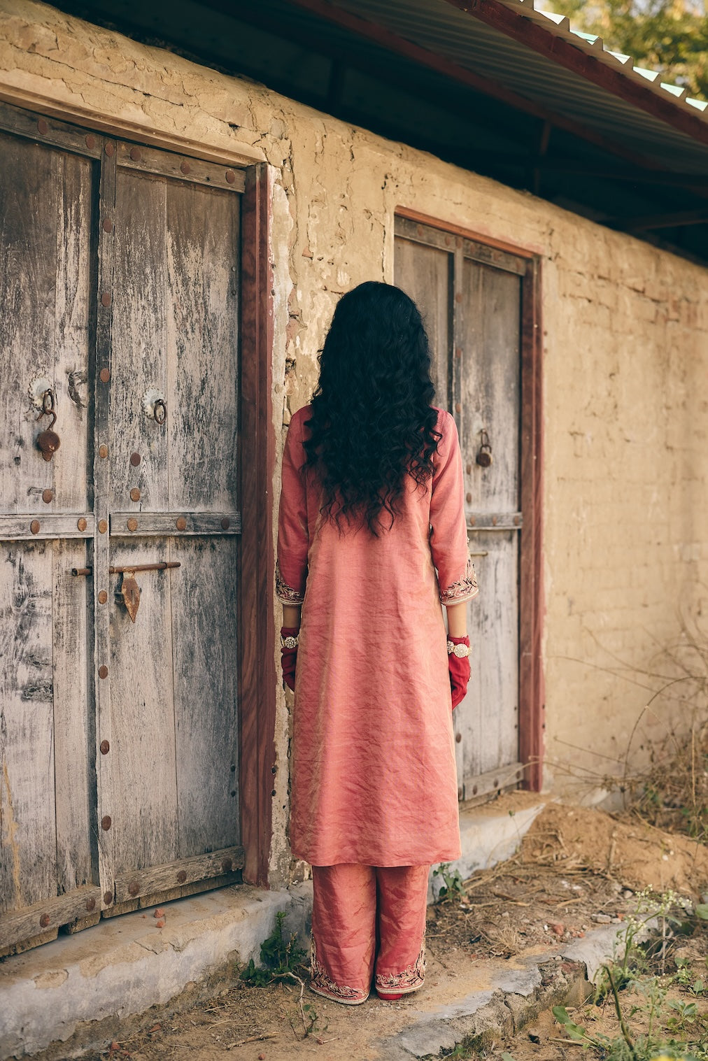 ARUNA & KAVYA coral tissue kurta set with botanical motifs by Rashika Mittal - back view