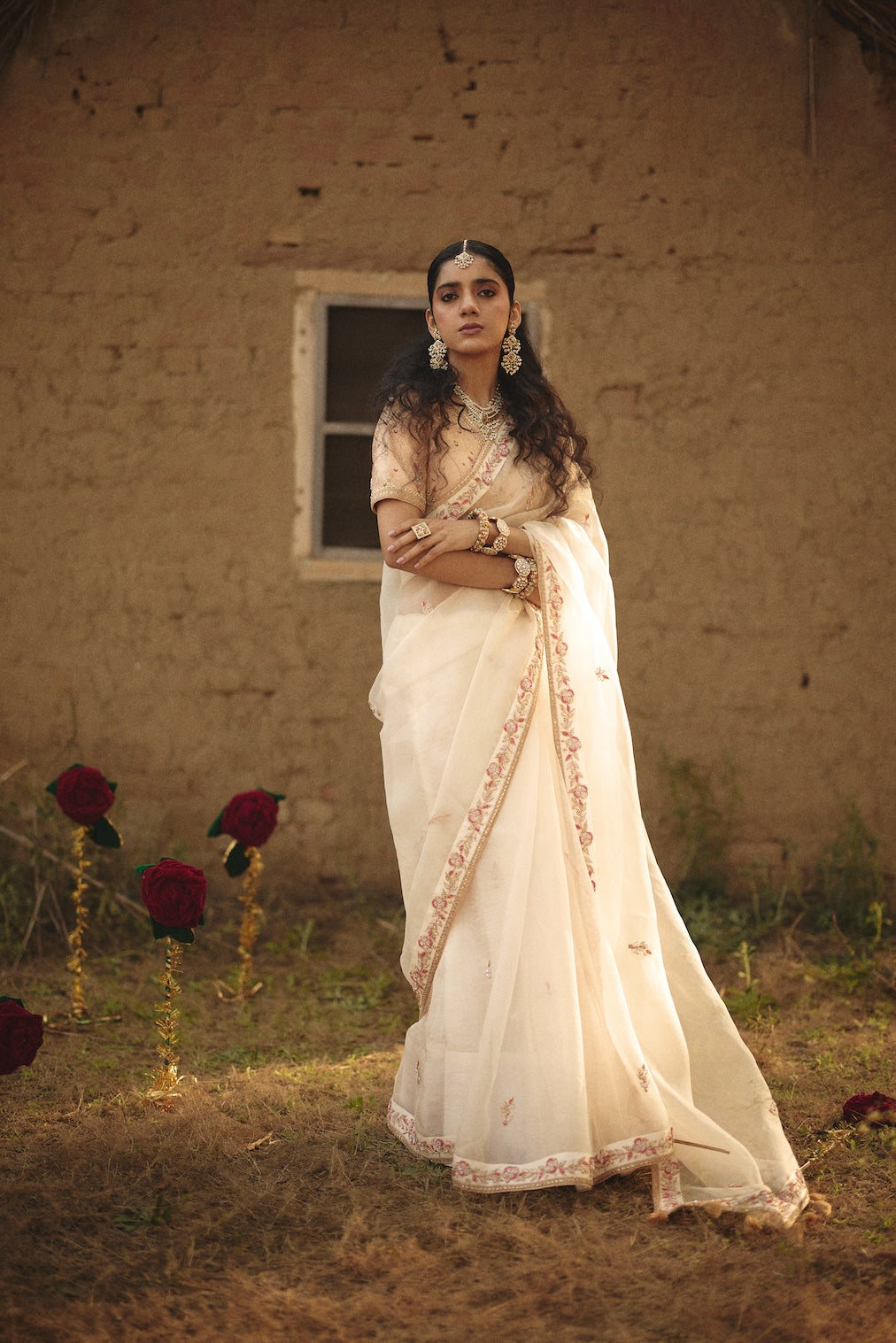 OJASVI champagne brocade saree with floral motifs by Rashika Mittal - full silhouette
