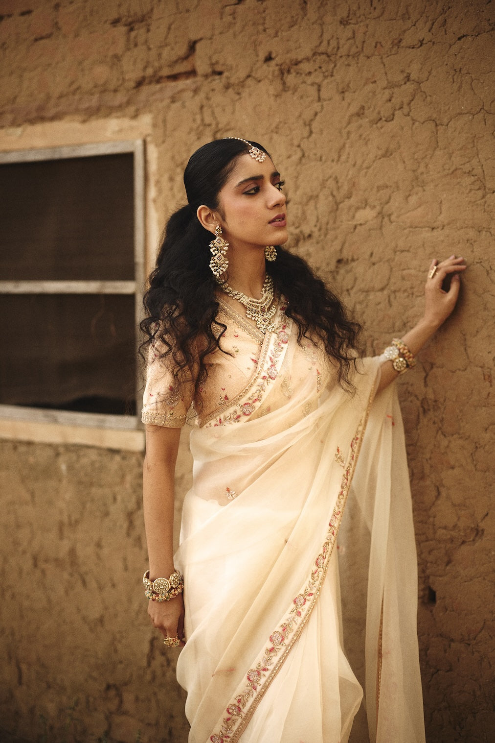 SHANVI ivory organza saree with nature motifs by Rashika Mittal - close-up detail