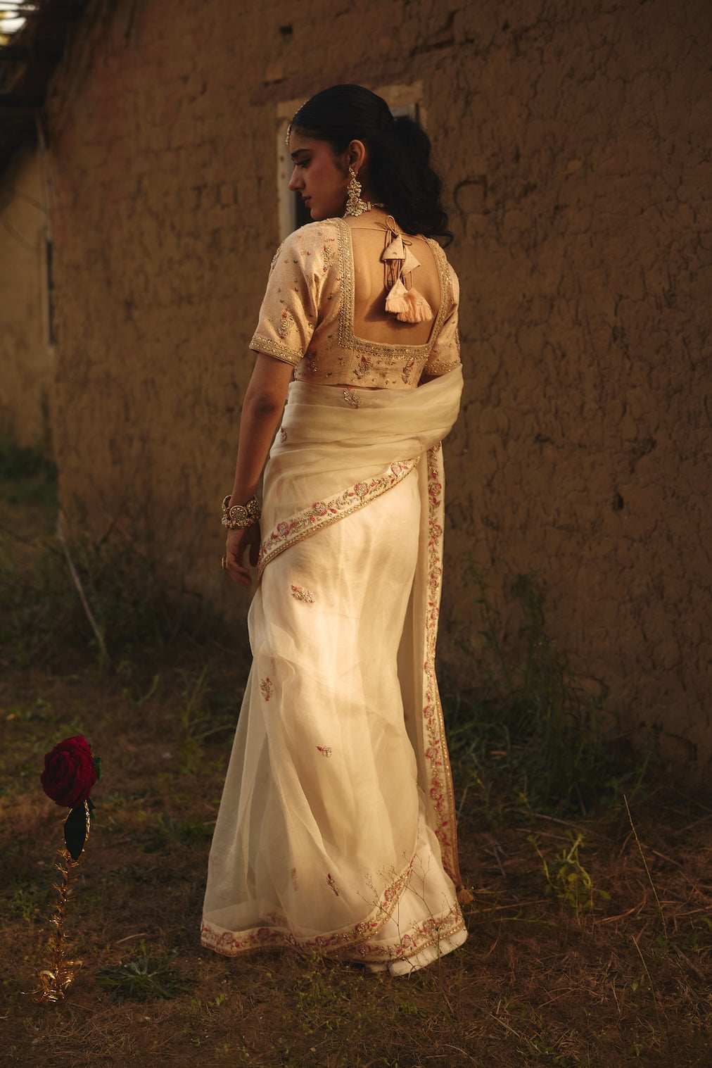 OJASVI champagne brocade saree with floral motifs by Rashika Mittal - fabric detail