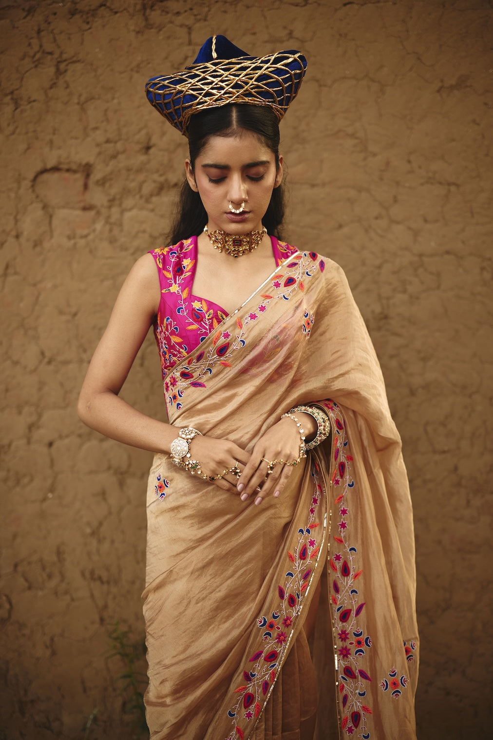 TARAANA gold tissue saree with floral motifs by Rashika Mittal - styled look