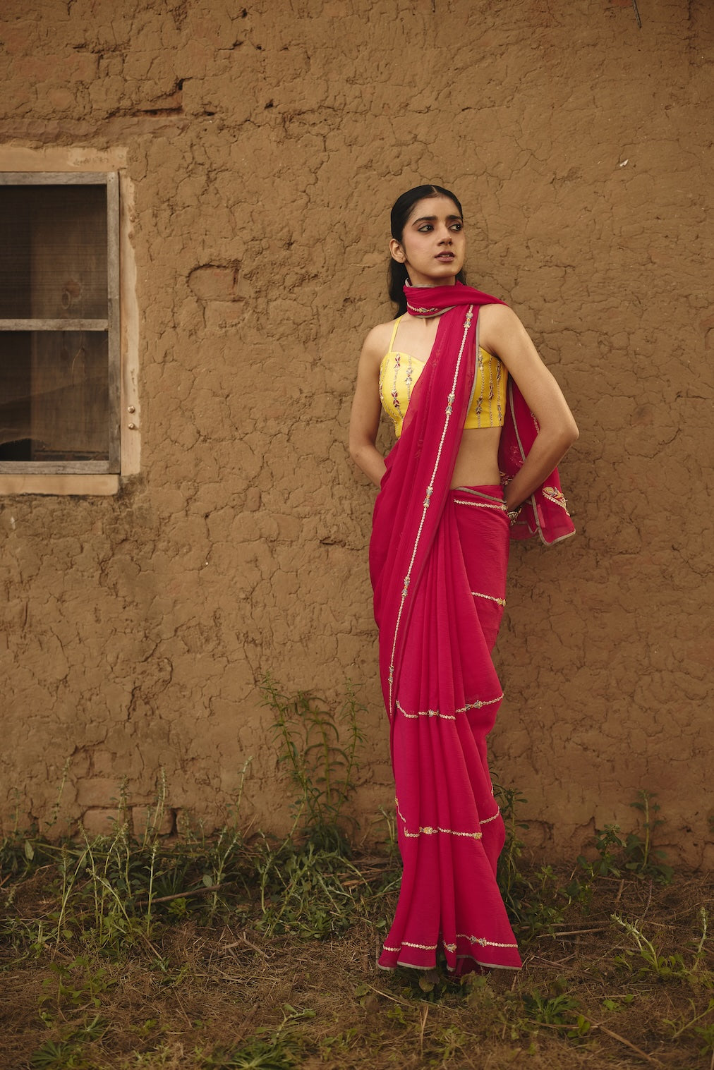 TEYA fuchsia chiffon saree with nature motifs by Rashika Mittal - close-up detail