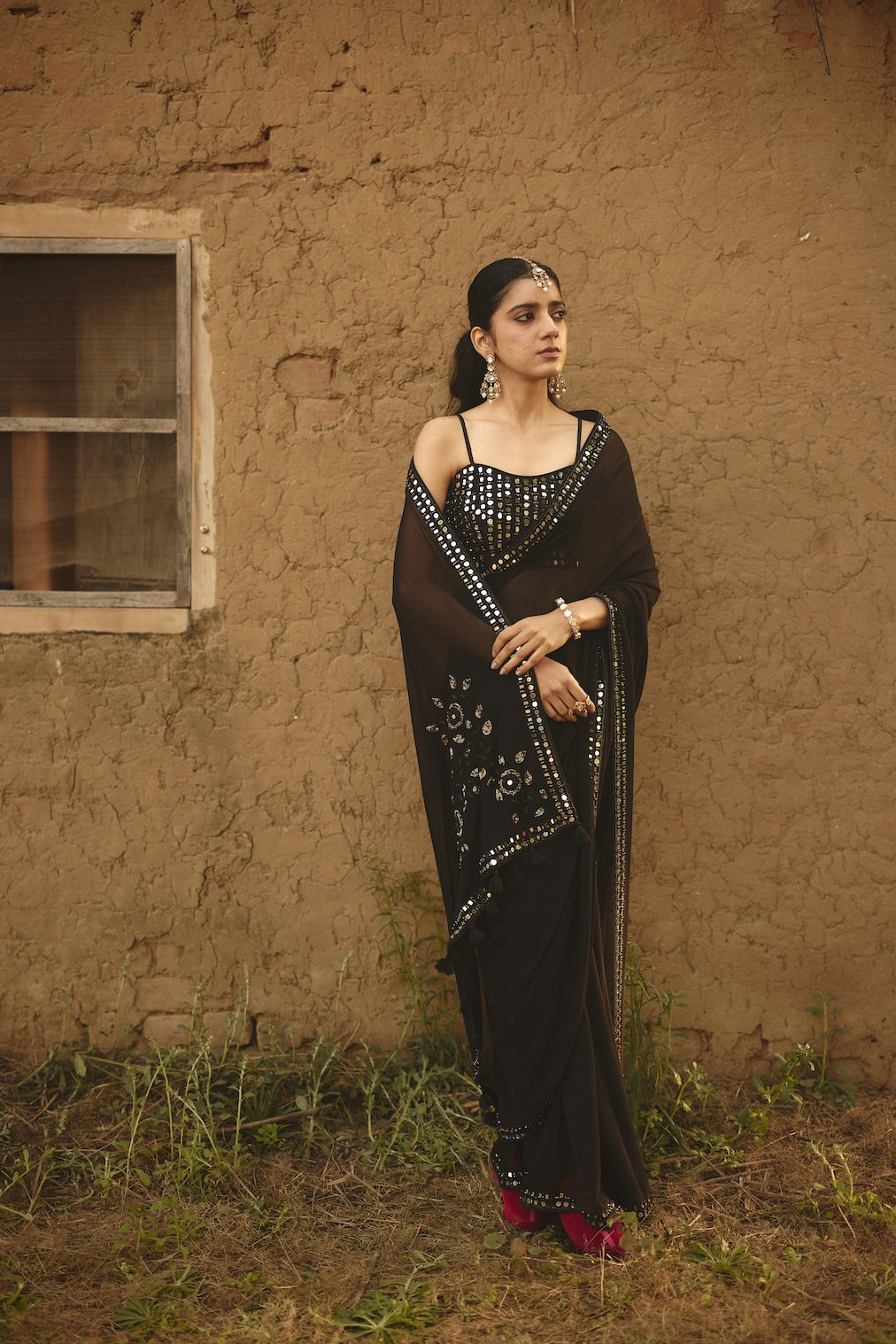 SARMAYA black chiffon saree with floral motifs by Rashika Mittal - styled look