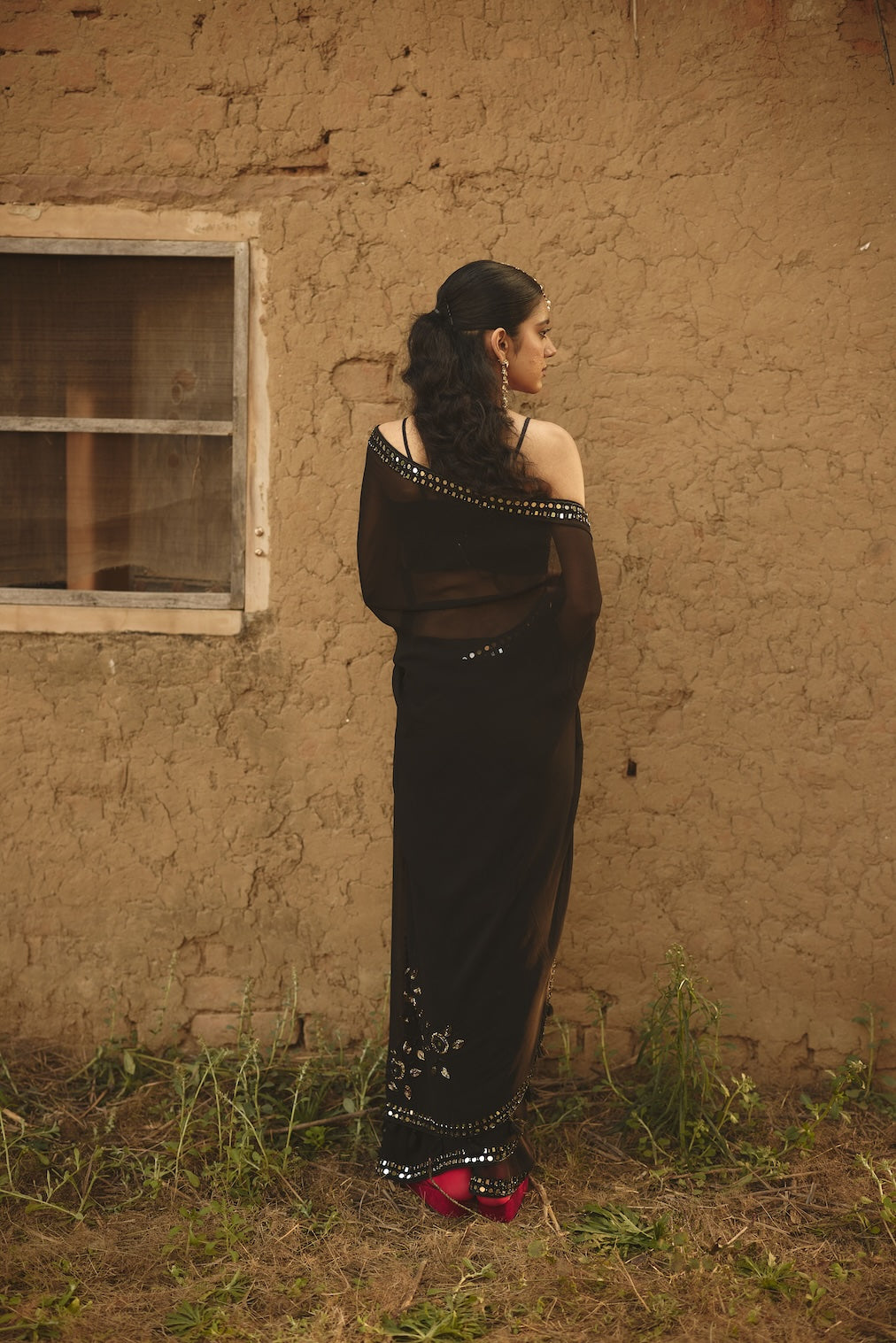 SARMAYA black chiffon saree with floral motifs by Rashika Mittal - fabric detail