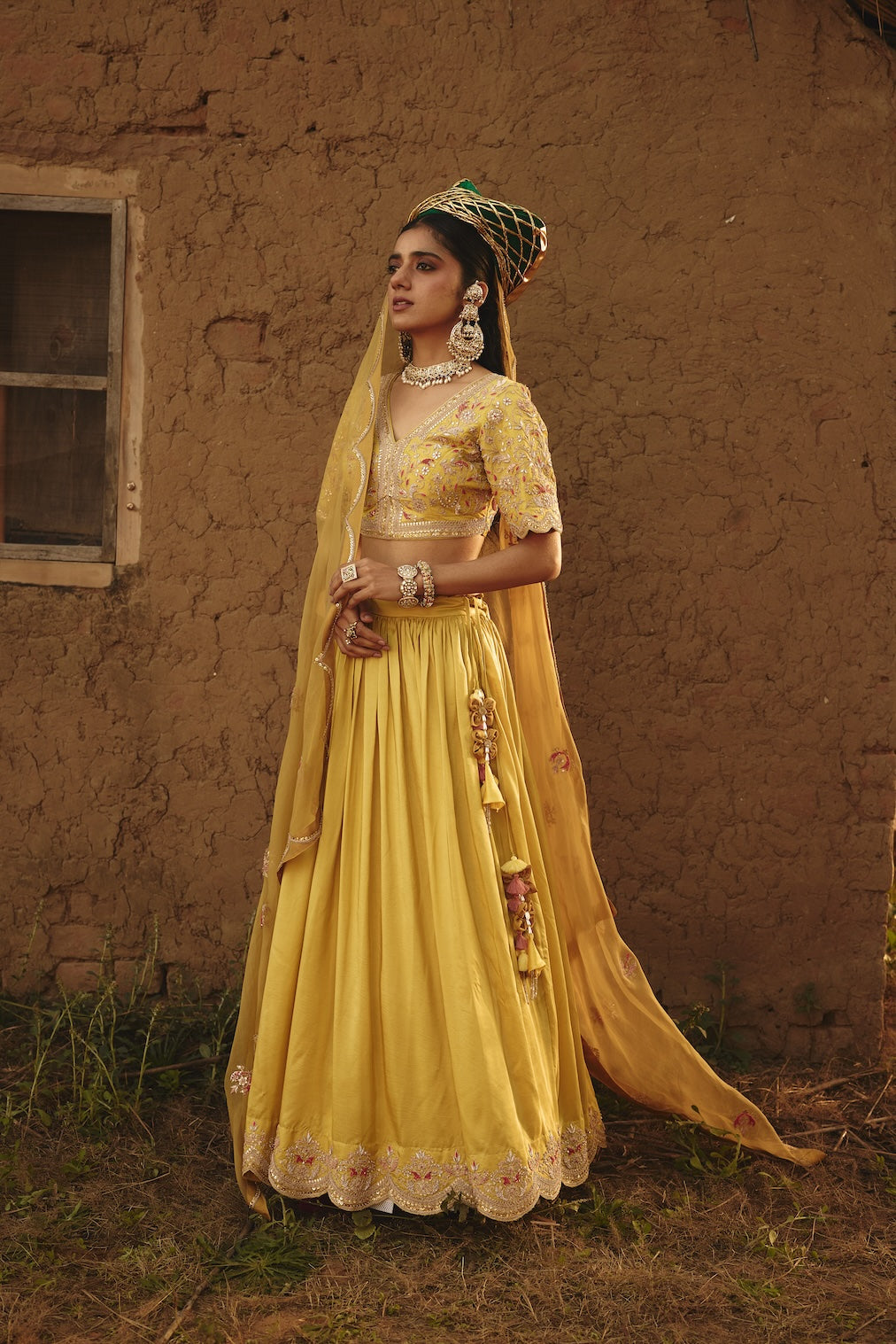 DRITI & HESYRA yellow silk lehenga with floral motifs by Rashika Mittal - close-up detail