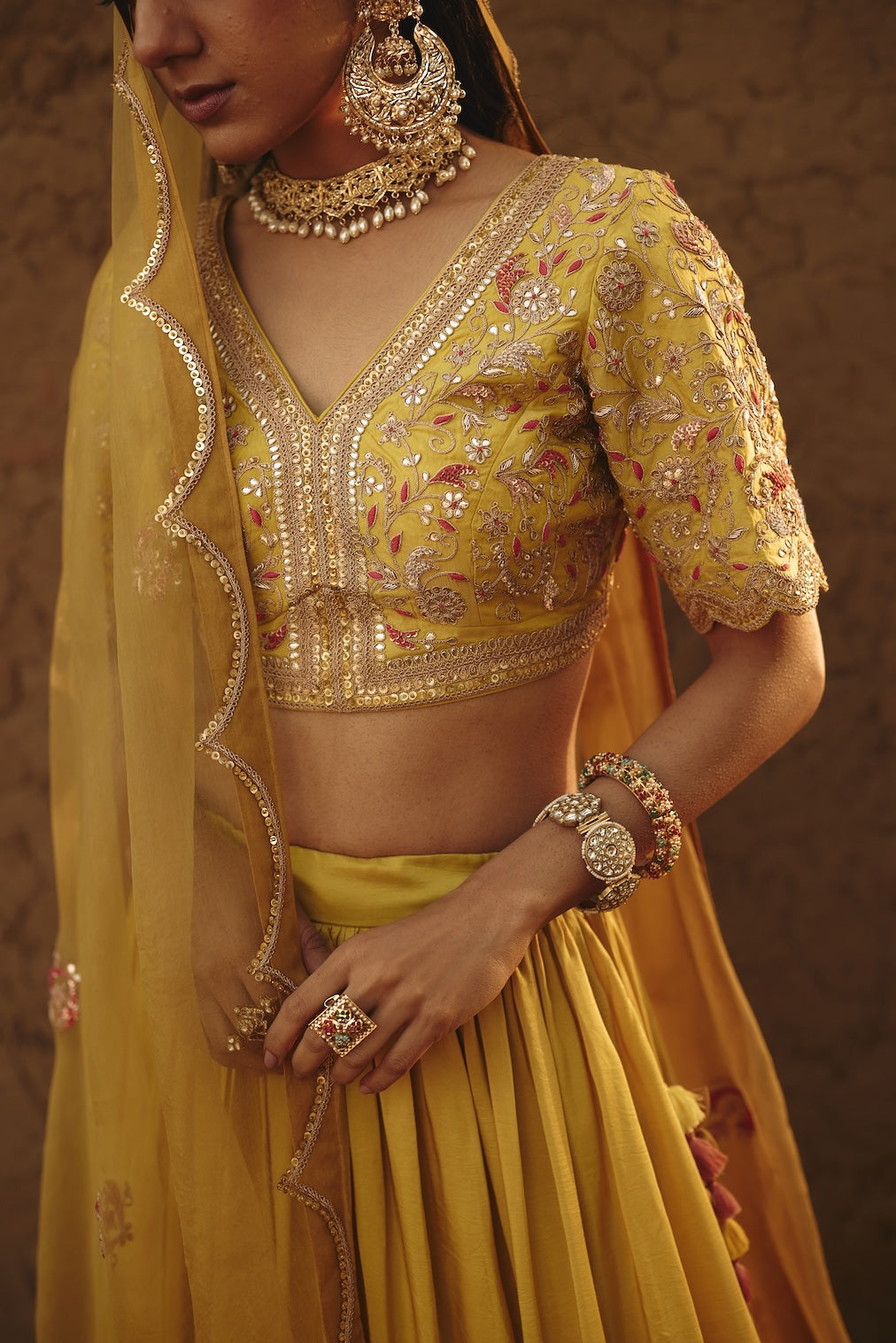 DRITI & HESYRA yellow silk lehenga with floral motifs by Rashika Mittal - styled look