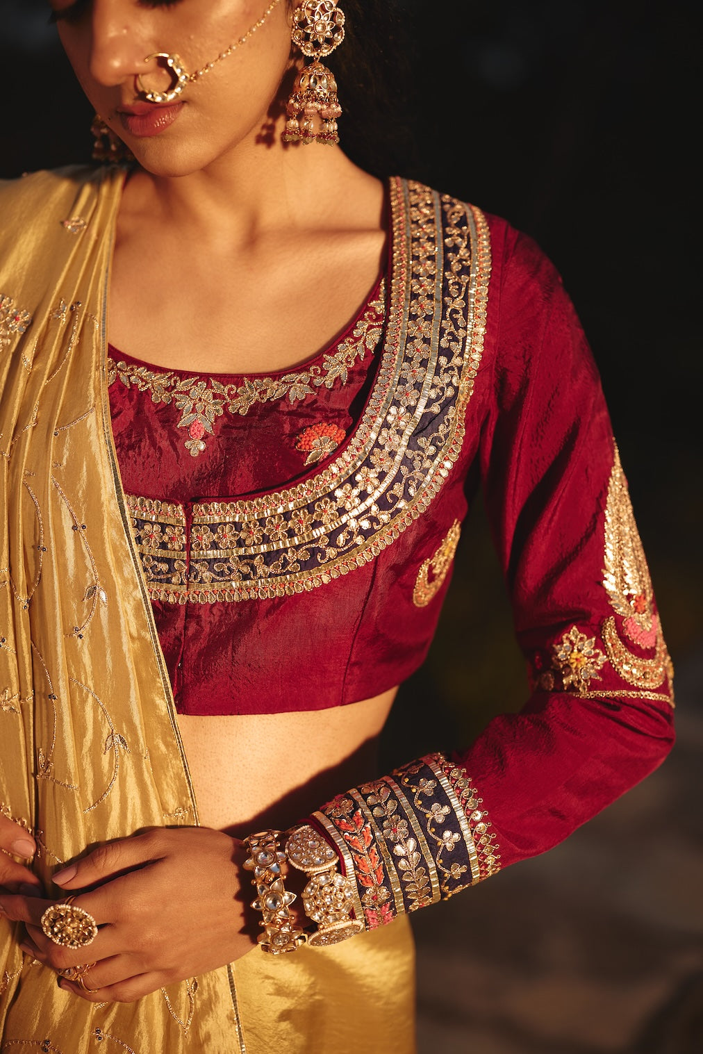 ZEHRAAT wine silk saree with floral motifs by Rashika Mittal - close-up detail