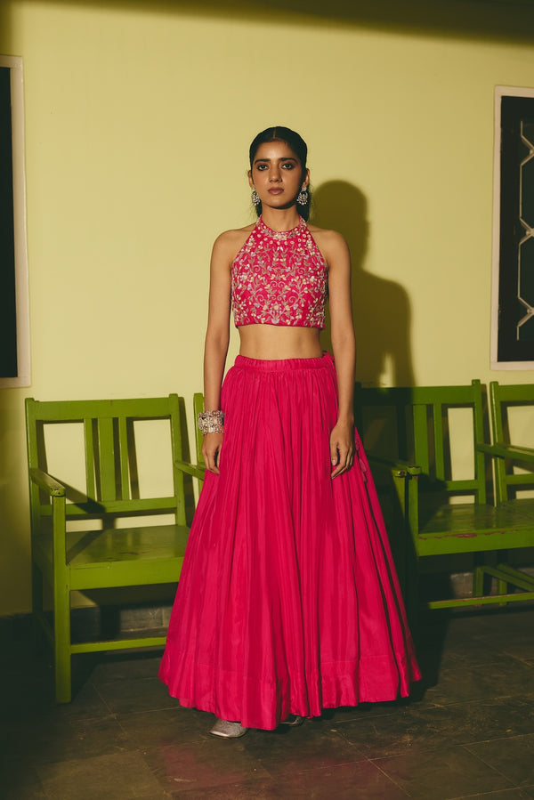 MEHERGUL & ABROO rani pink silk lehenga with floral motifs by Rashika Mittal - front view