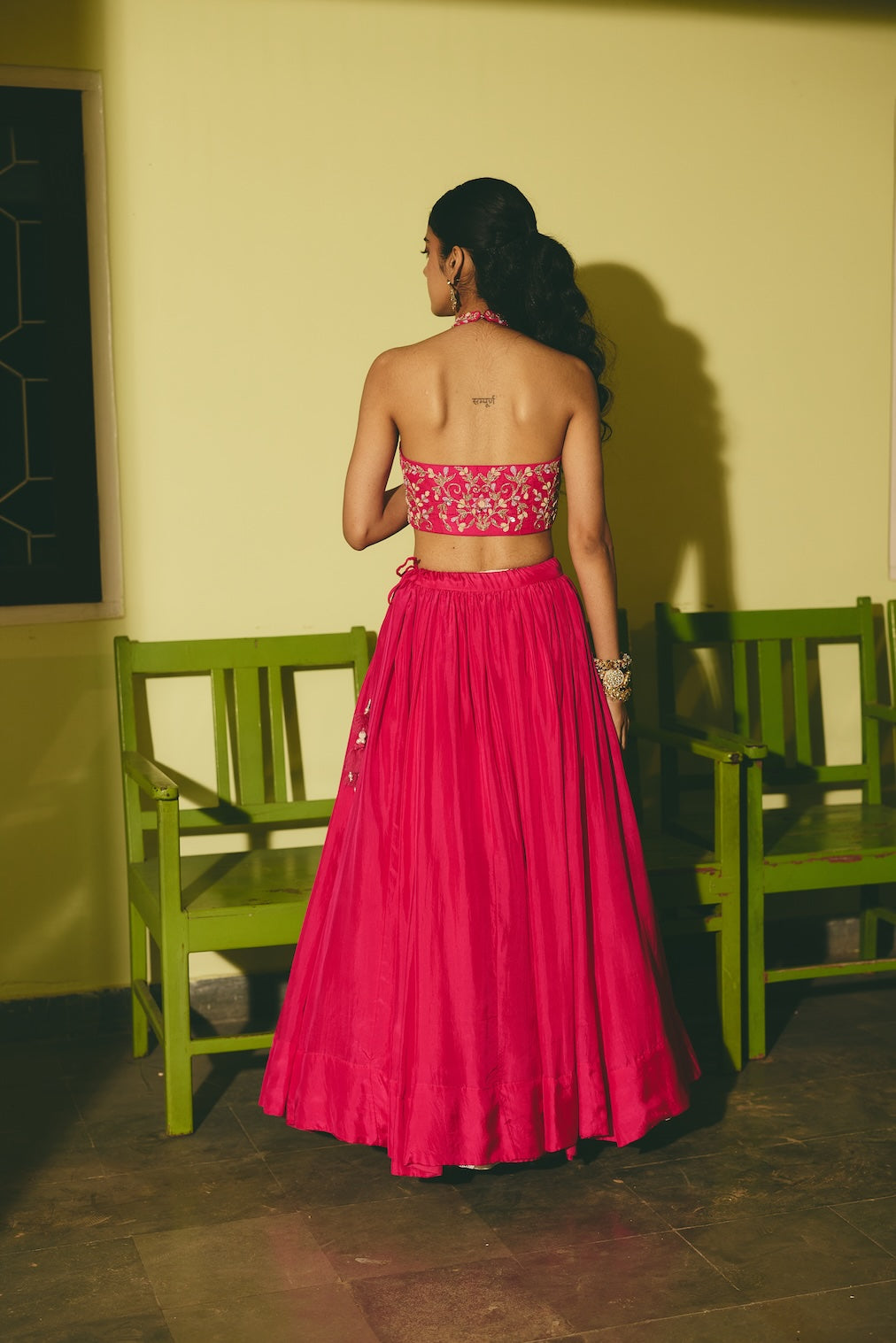 MEHERGUL & ABROO rani pink silk lehenga with floral motifs by Rashika Mittal - back view
