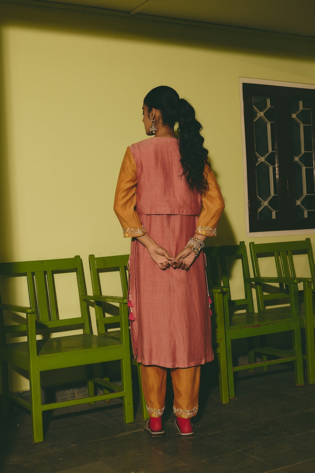 RUHANIYAT & AMBER terracotta chanderi kurta set with mughal motifs by Rashika Mittal - back view