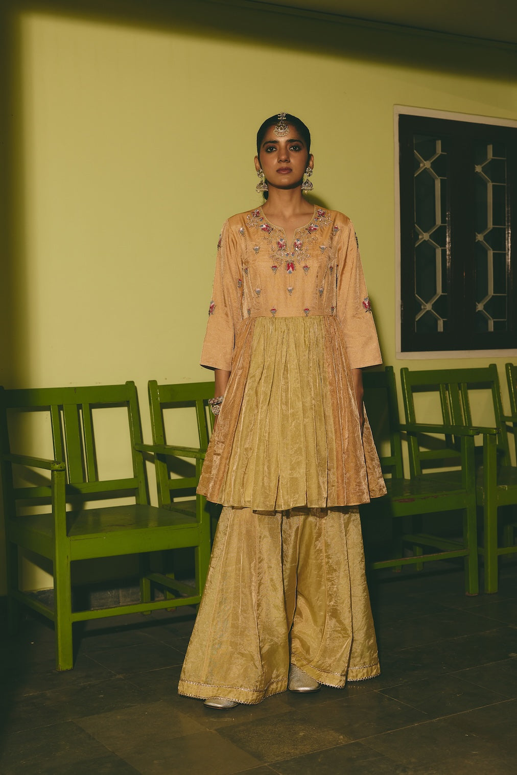 ANANYA & TAVISHI gold tissue sharara set with floral motifs by Rashika Mittal - front view