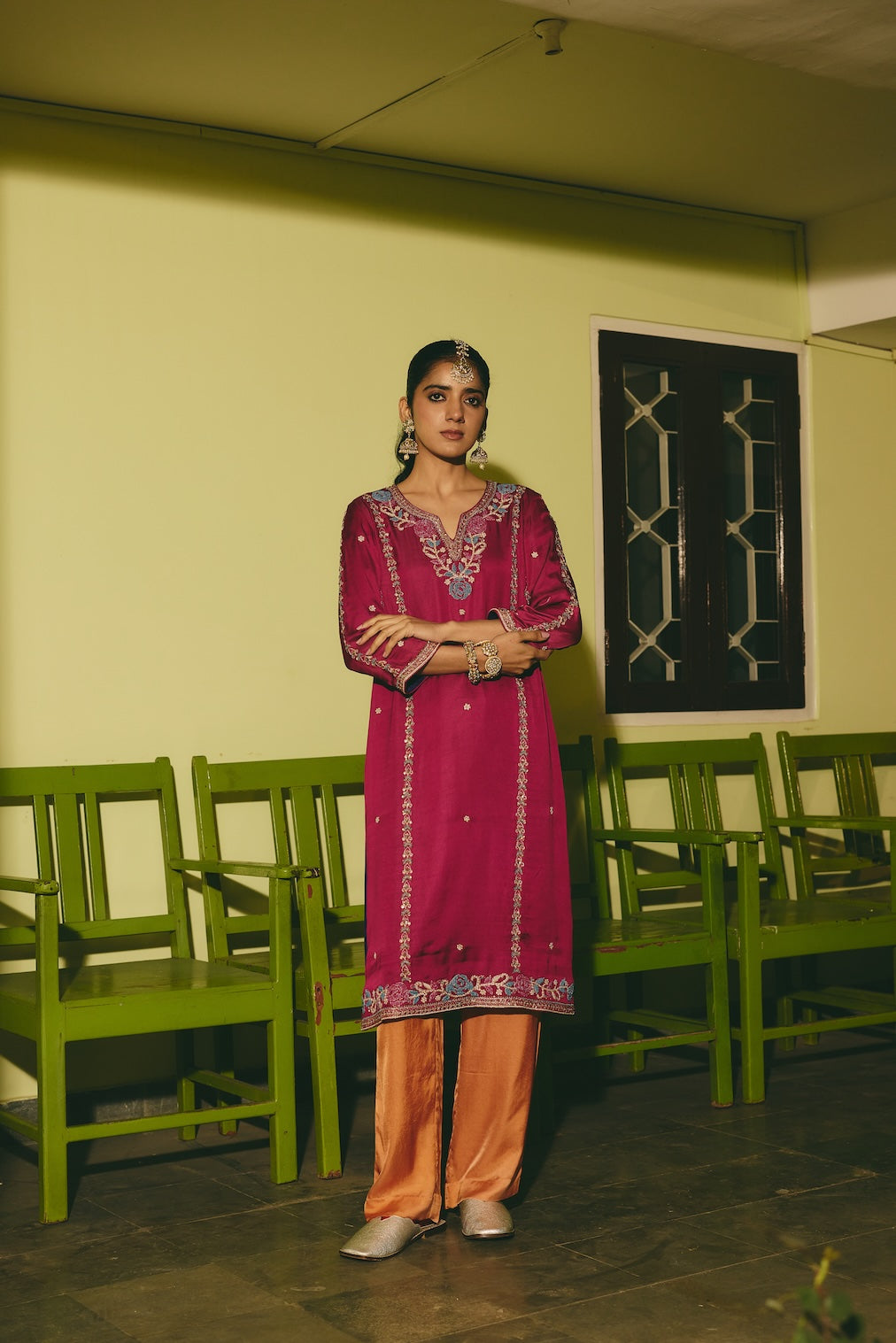 NAUREH & SUHAIL magenta satin kurta set with floral motifs by Rashika Mittal - front view